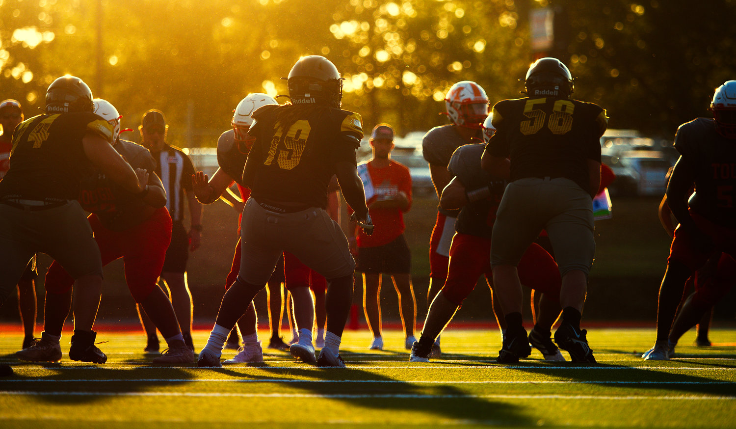 The late summer sun highlights the Mineola and Winona football teams during last Friday’s scrimmage at Meredith Memorial Stadium in Mineola, signaling the beginning of the 2022 football season for Texas high schools.